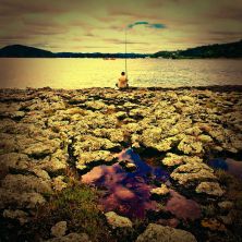lonely fishing man-  new zealand.jpg
